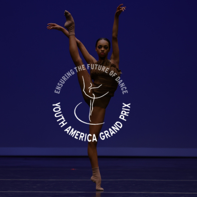 A female dancer in a ballet pose behind the YAGP logo